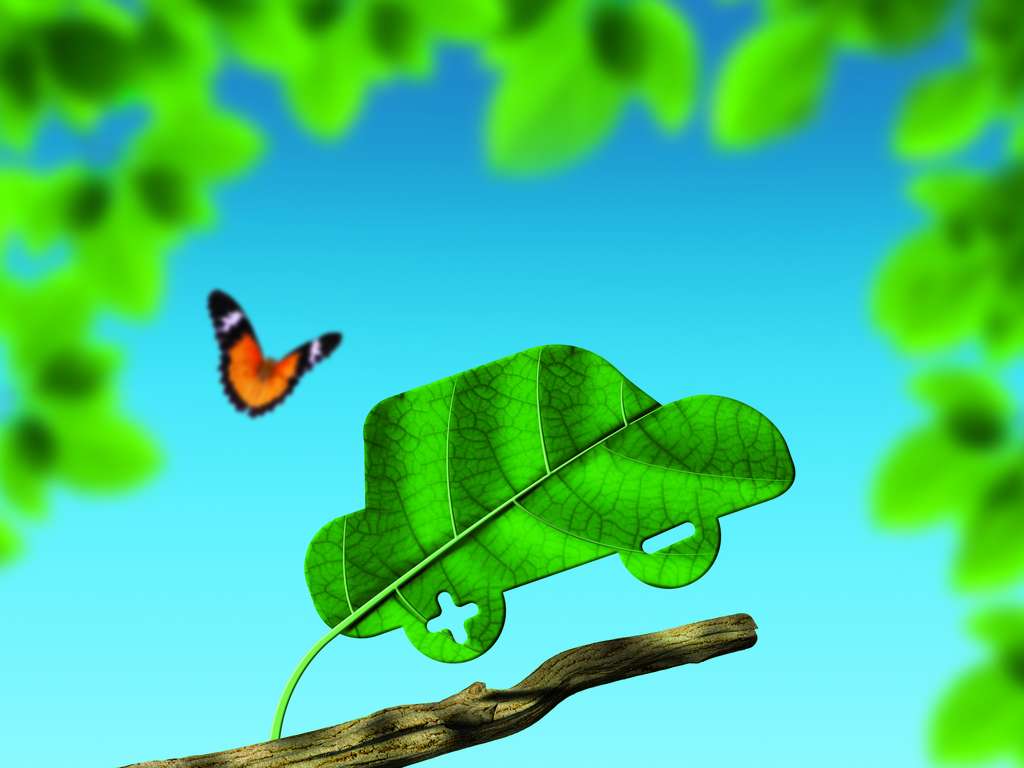 Grafik eines Elektroautos, dass aus einem Baum-Blatt ausgeschnitten scheint (Design)